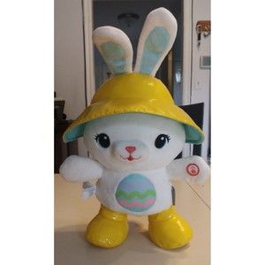 Hallmark Hoppy Bunny plush with yellow rain hat that sings and dances.